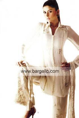 Vintage white shalwar kameez having floral and organza flower ornaments